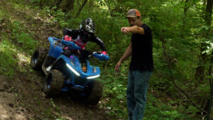 Alt text:Denago E-Hawk 6 four-wheel hydraulic disc brake system on a youth electric ATV.