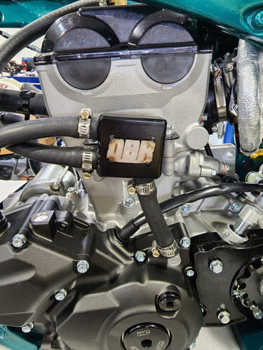 DBR Race Products breather box installed on the left side of a Yamaha YFZ450R engine.