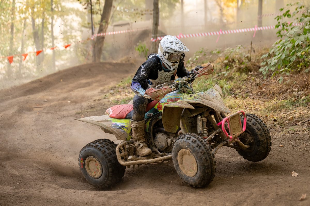 Hunter Hart corners his ATV through the woods at the 2026 Ironman GNCC