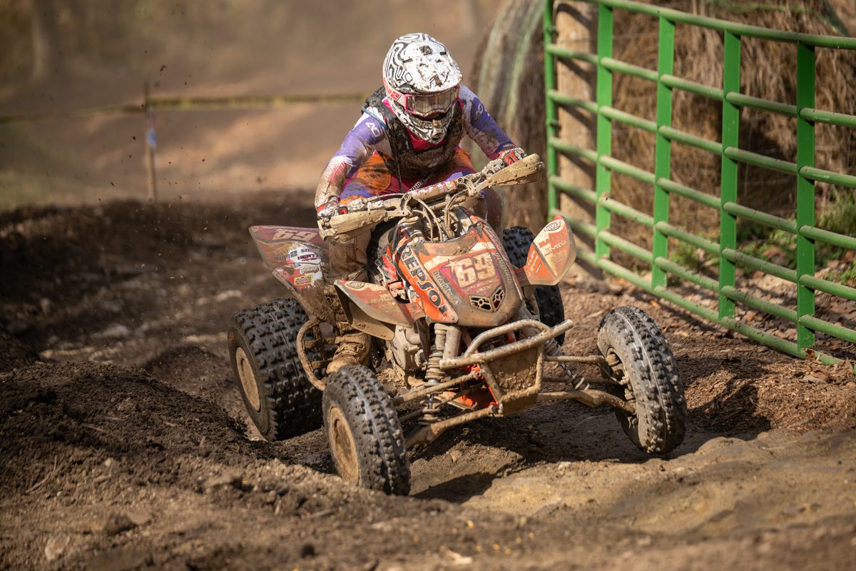 Layne McCormick rides through the wooded course at the 2026 Ironman GNCC