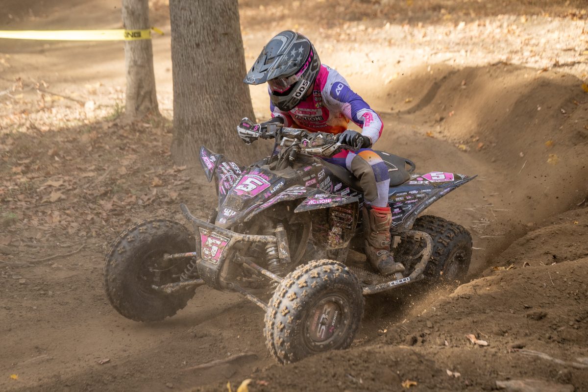 Wyatt Wilkin races his ATV around a tree at the 2026 Ironman GNCC