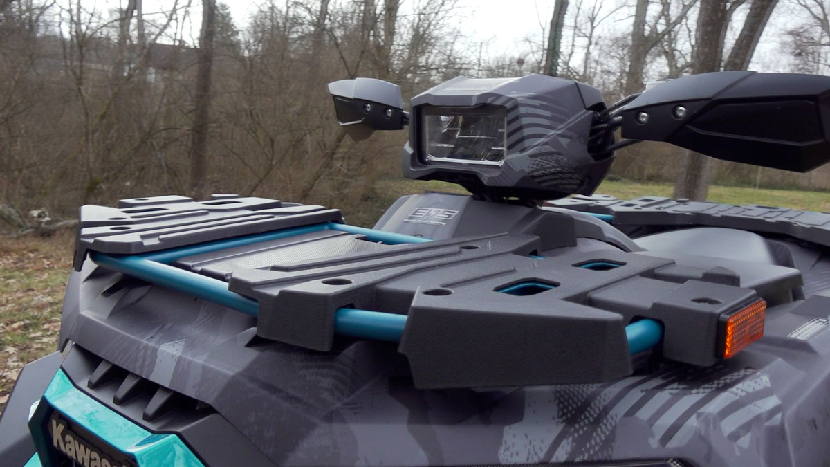 Three-quarter view of the Kawasaki Brute Force 750, highlighting the front rack and onboard storage compartments.